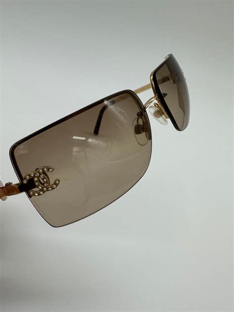 chanel sunglasses gold rim|chanel sunglasses quilted sides.